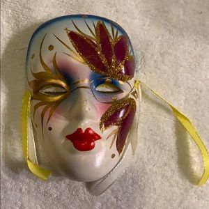 Purple and gold glitter Mardi Gras mask